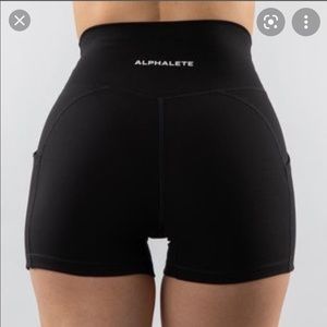 ALPHALETE SURFACE POCKET SHORTS